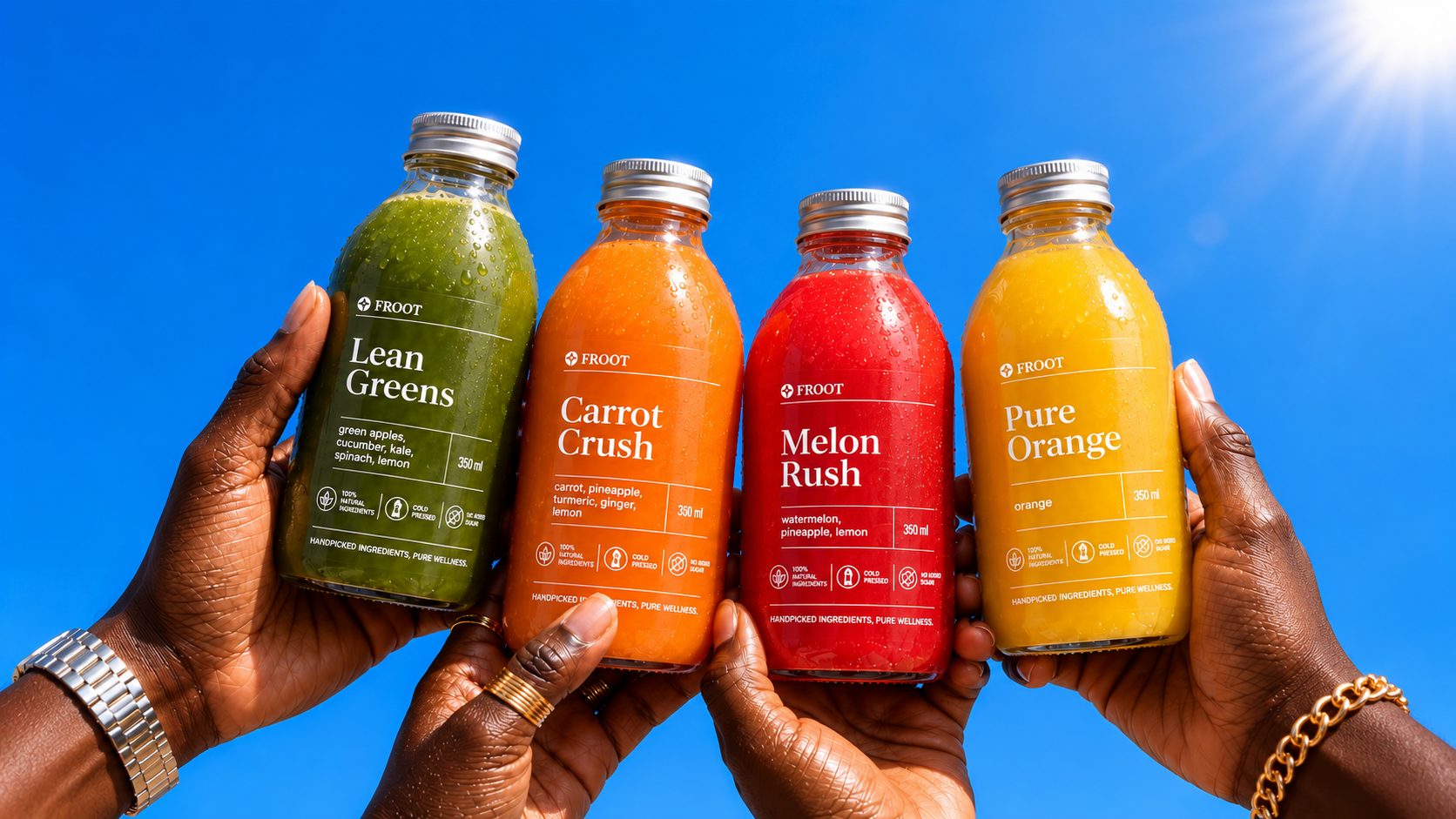 Four hands raising bottles of Lean Greens, Carrot Crush, Melon Rush and Pure Orange against a blue sky